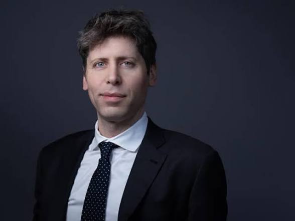 Portrait of OpenAI CEO Sam Altman in a dark suit against a dark backdrop